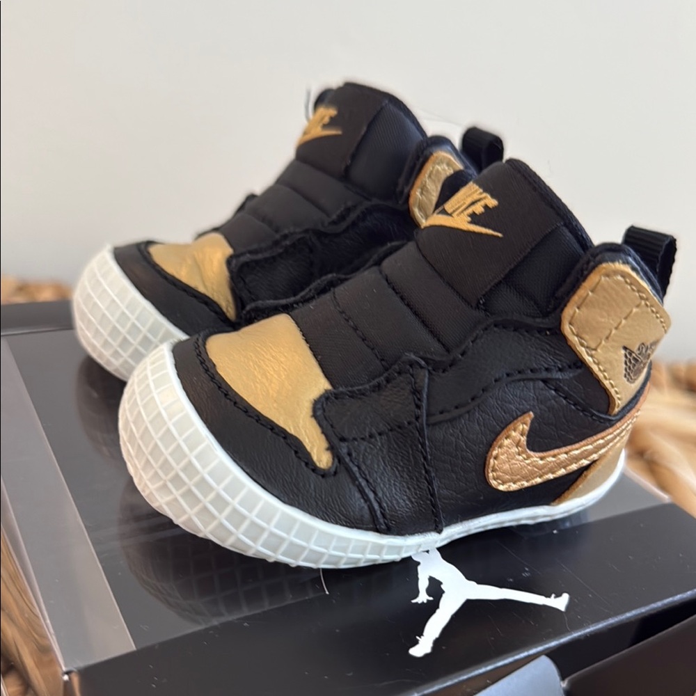 Nike Black and Gold Sneakers High-Top Design